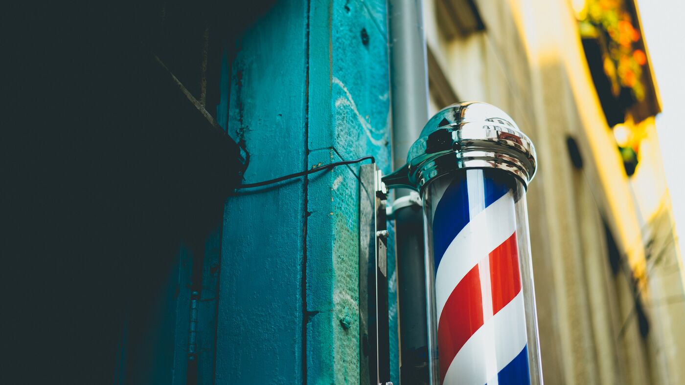 Classic barber pole outside Black Turtle Salon