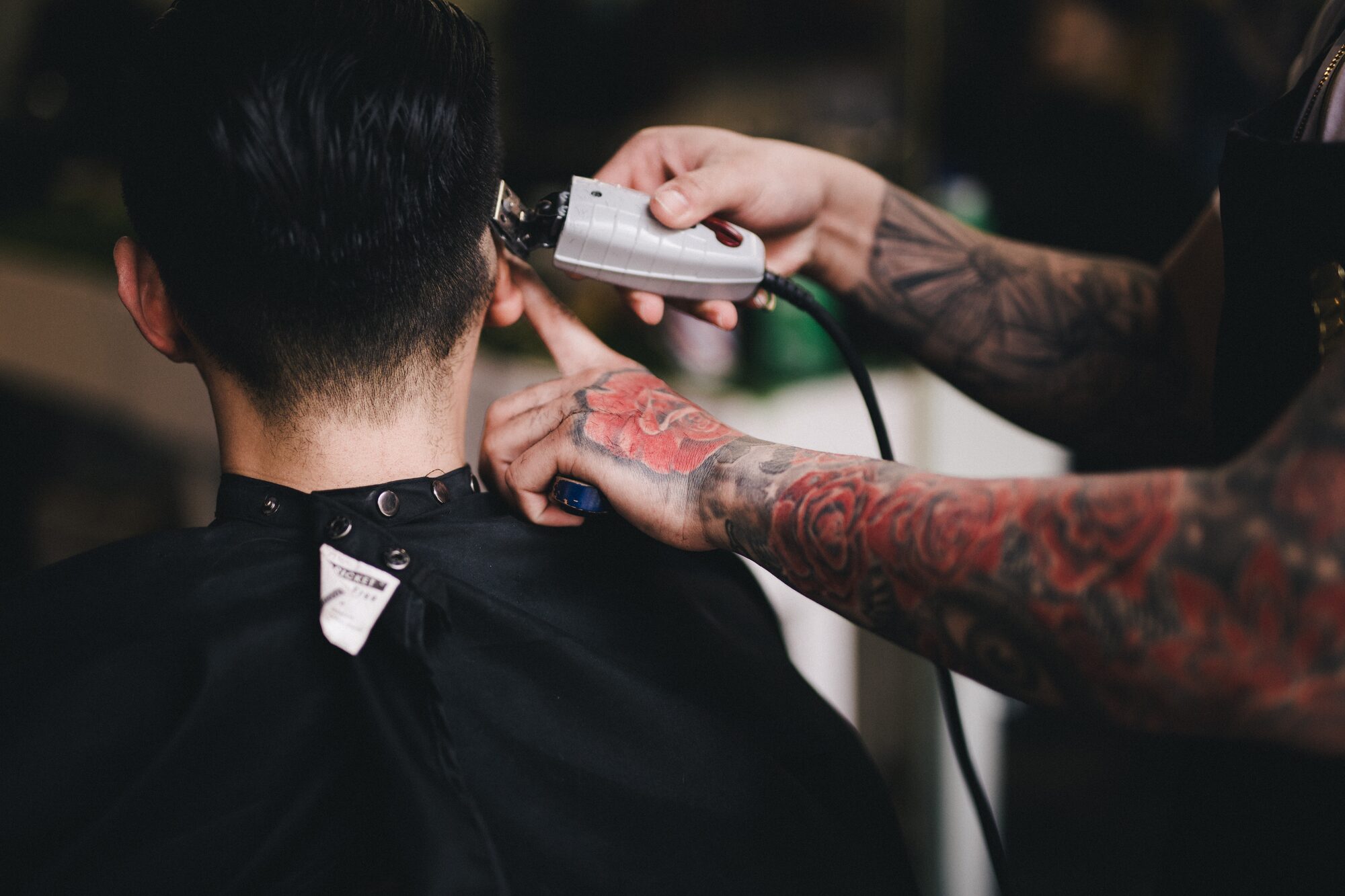 Barber at work inside Black Turtle Salon